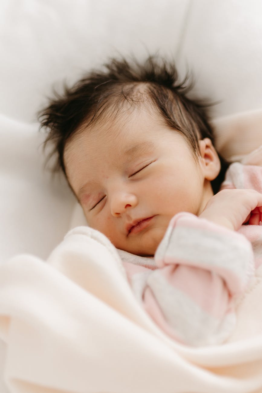 baby sleeping in bed