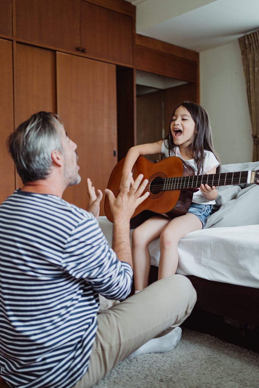 a girl playing a guitar