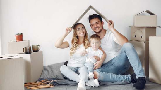 family-moving-using-boxes