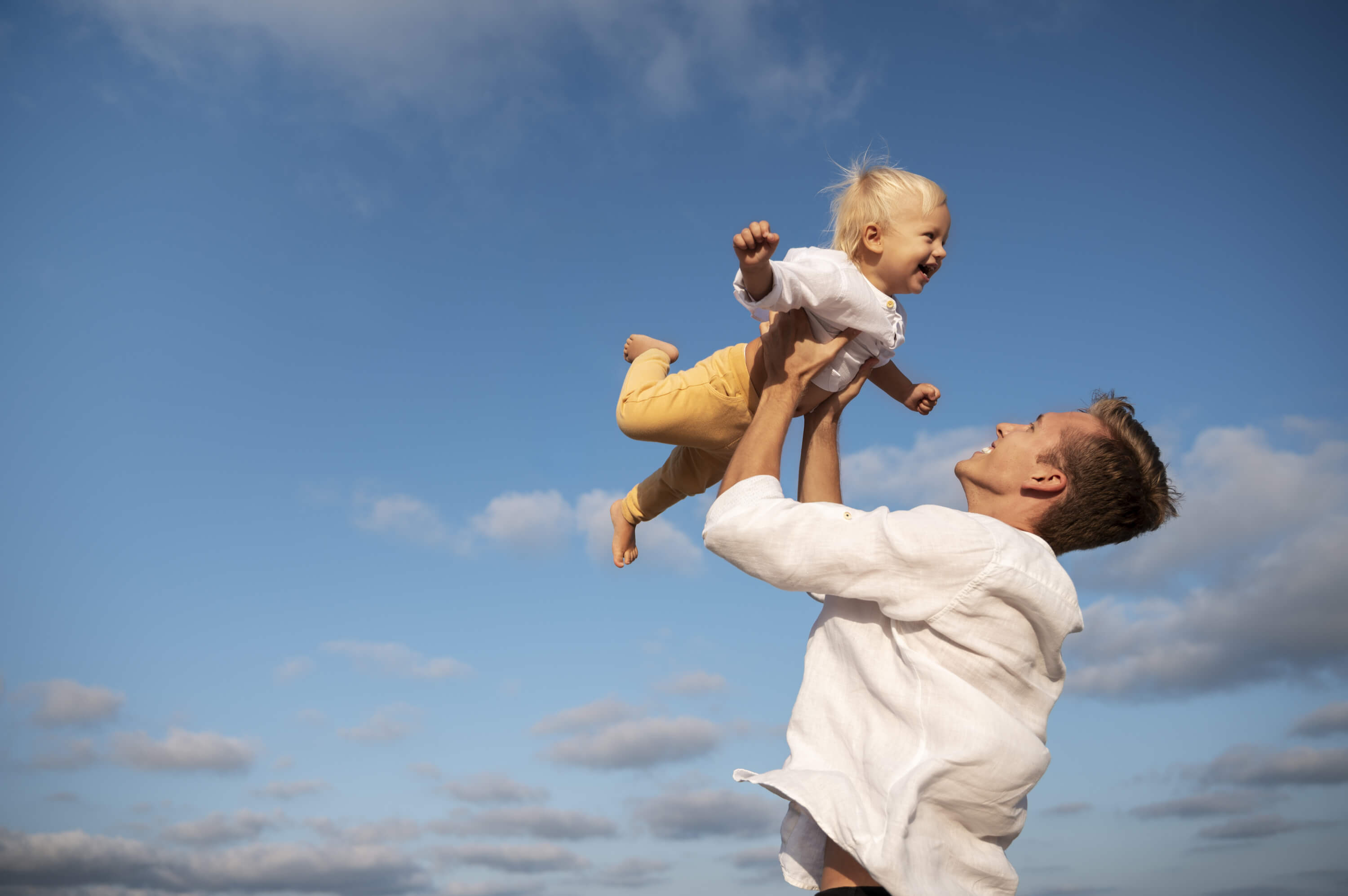 parent-with-baby-beach